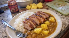 Curry-Reis mit Ananas und knuspriger Entenbrust – fruchtig-würzig und einfach gemacht