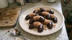 Schoko-Nougat-Kipferl mit Zartbitterspitzen – mürbe Plätzchen, die immer gelingen