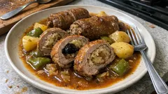 Sauerkrautrouladen mit Kalb und Pflaumen – ein Schmorgericht, das immer saftig wird